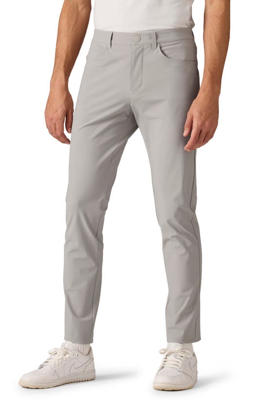 Shop Rhone Momentum Water Repellent Flat Front Golf Pants In Fossil Gray