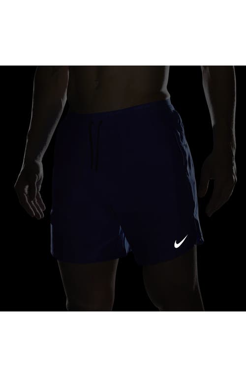 Shop Nike Dri-fit Stride 7-inch Brief-lined Running Shorts In Game Royal/black