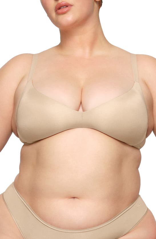 Shop Skims Wireless Form Push-up Plunge Bra In Sand