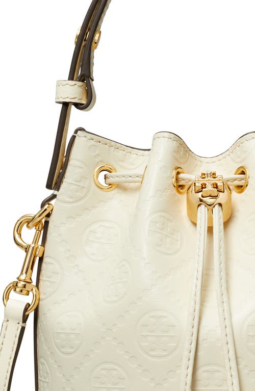 Shop Tory Burch Mini T Monogram Debossed Bucket Bag In Light Cream