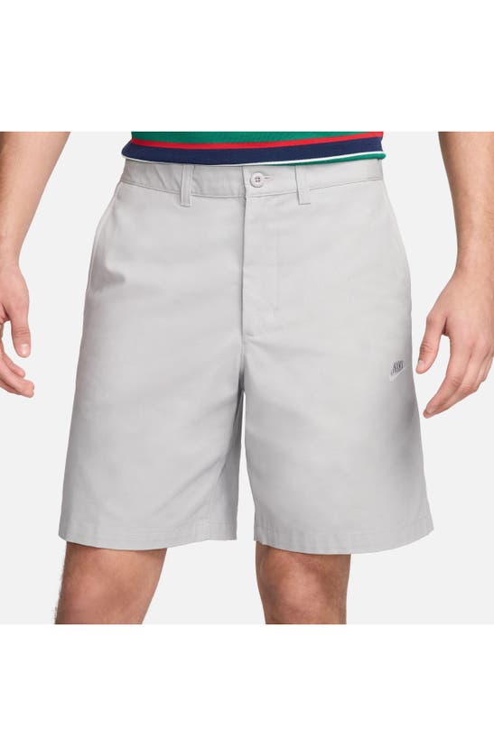 Shop Nike Club Flat Front Chino Shorts In Light Smoke Grey