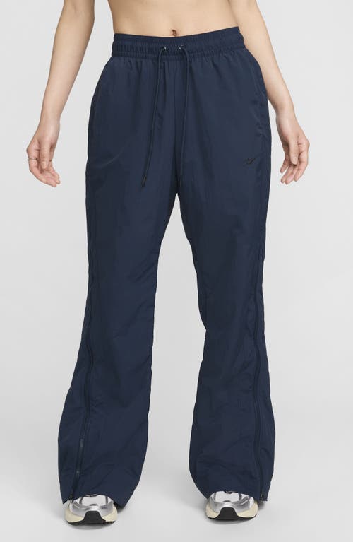 Shop Nike Sportswear Repel Zip Hem Pants In Armory Navy/black