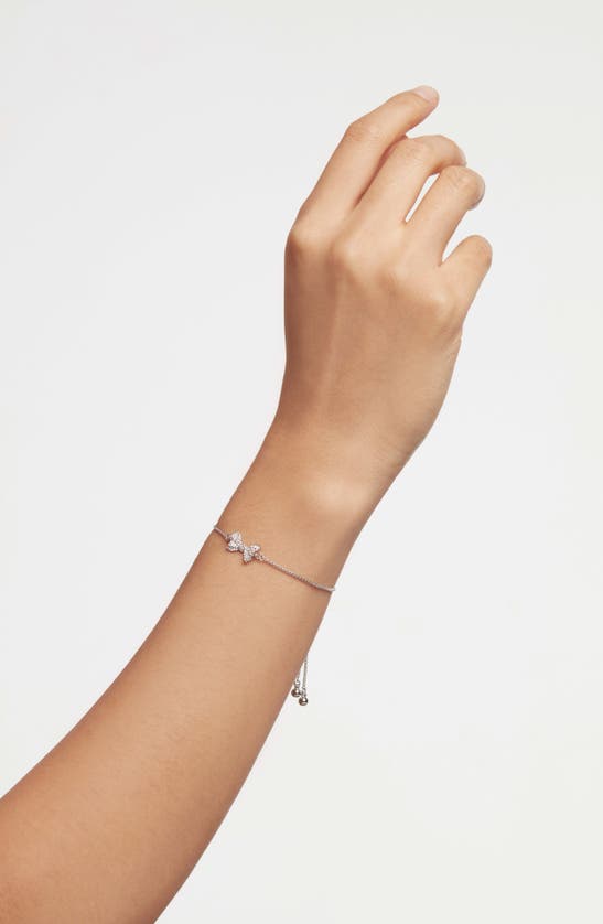 Shop Ted Baker Barset Pavé Crystal Bow Slider Bracelet In Silver Tone/ Clear Crystal