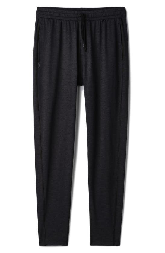 Shop Rhone Ooo Tapered Knit Pants In Black