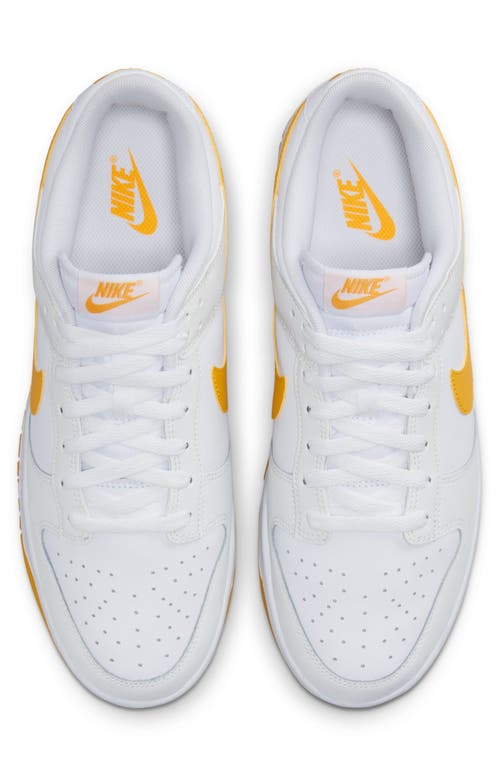 Shop Nike Dunk Low Retro Basketball Sneaker In White/university Gold/white