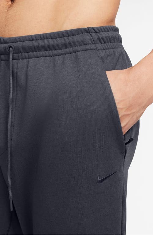 Nike Men's Primary Fleece Dri-fit Uv Performance Jogger Pants In Obsidian/heather