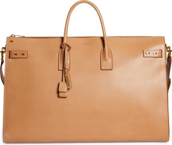 A show stopping YSL tote! The perfect travel tote/work bag/diaper