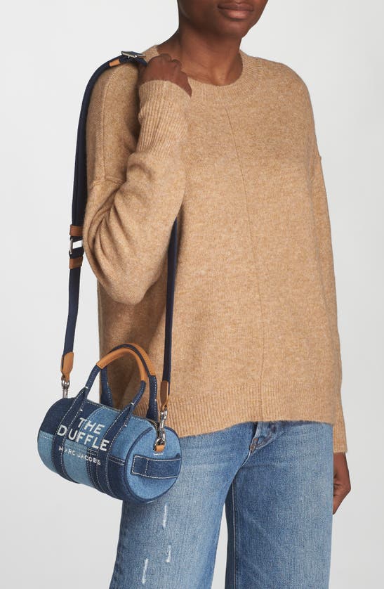 Shop Marc Jacobs The Mini Denim Duffle Bag In Blue Denim
