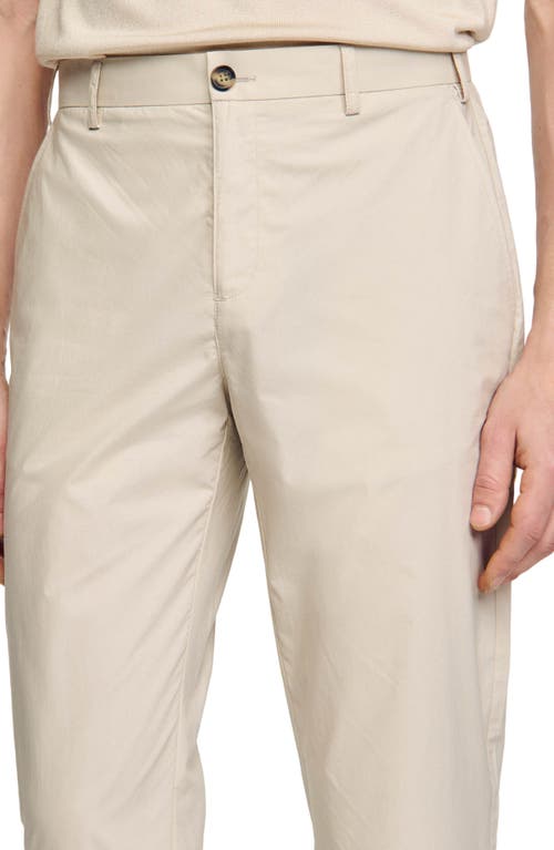 Shop Sandro Cotton Carrot-cut Trousers In Light Grey