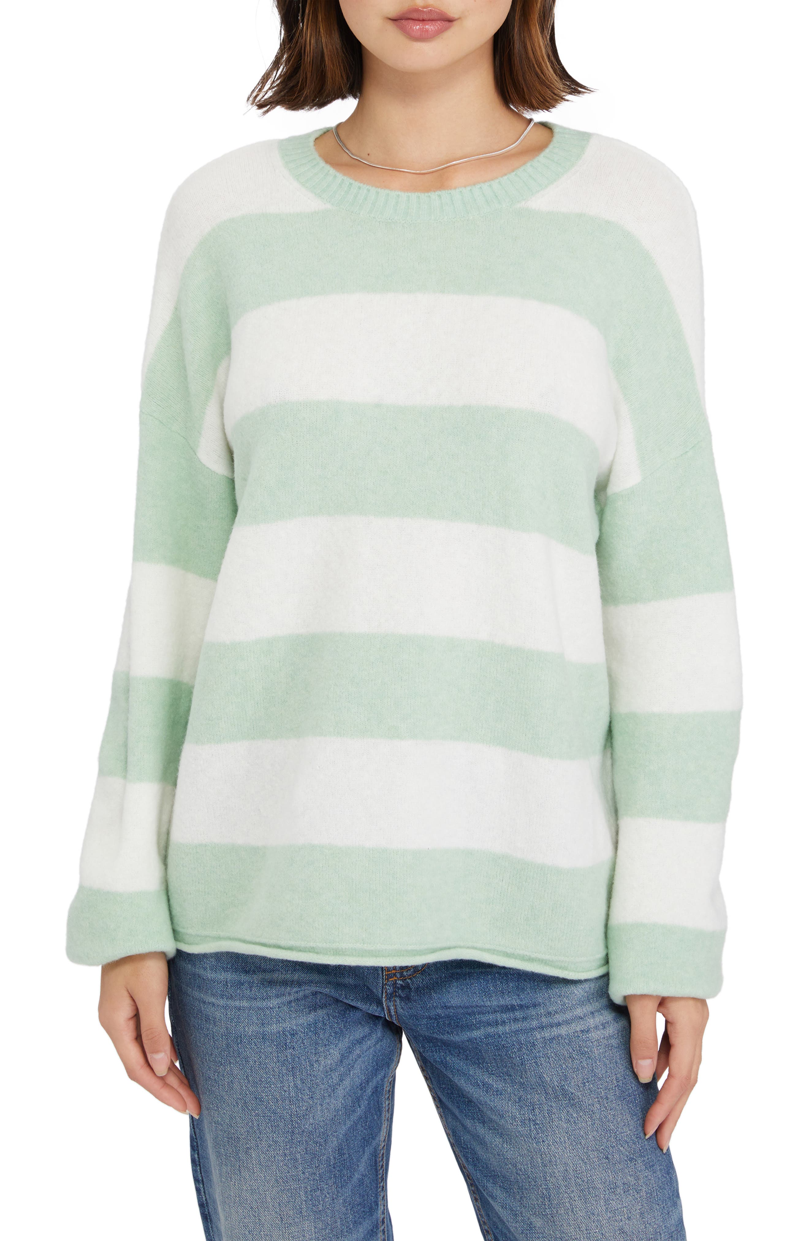 white and green sweater