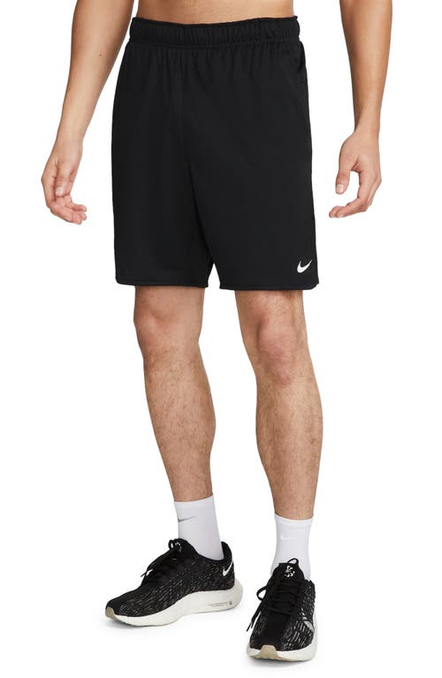 Shop Nike Dri-fit 7-inch Brief Lined Versatile Shorts In Black/iron Grey/white