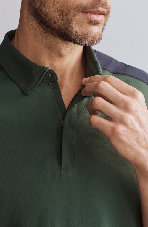 Shop Rhone Momentum Quarter Zip Polo In Jungle Green