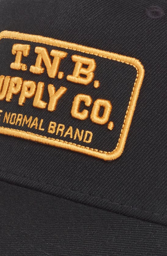 Shop The Normal Brand Supply Co. Trucker Hat In Black