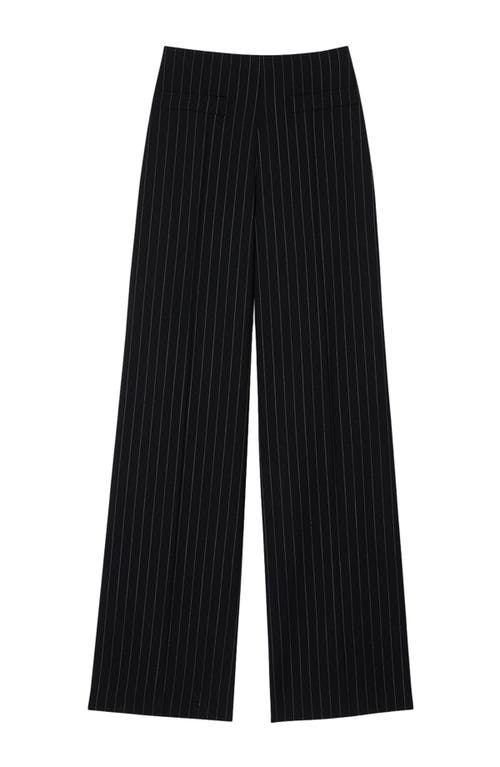 Shop Sandro Chalk-striped Trousers In Black