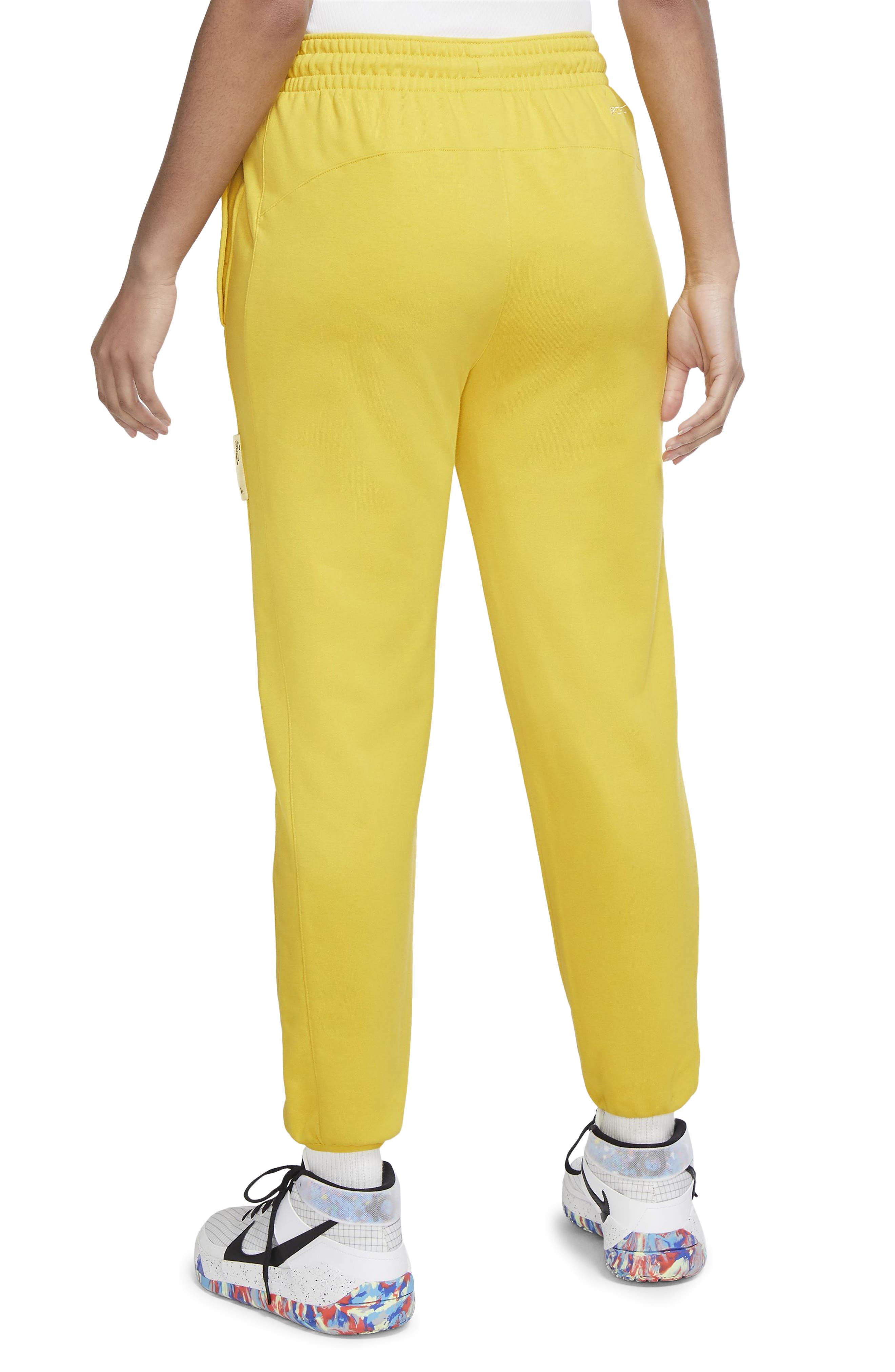 nike sweatpants yellow