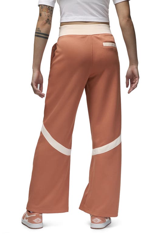 Shop Jordan (her)itage Snap Track Pants In Sky Orange/guava Ice