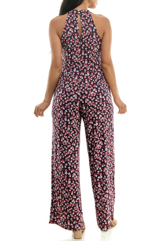 Shop Nina Leonard Twisted Halter Neck Jumpsuit In Navy/red Multi