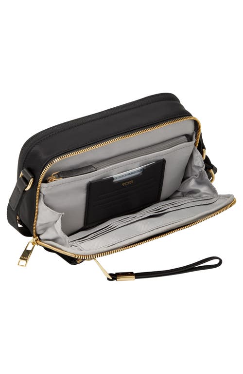 Shop Tumi Langley Crossbody Bag In Black/gold