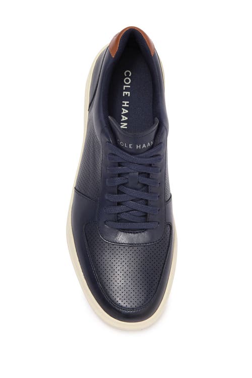 Shop Cole Haan Grand Crosscourt Modern Perforated Sneaker In Peacoat/british Tan