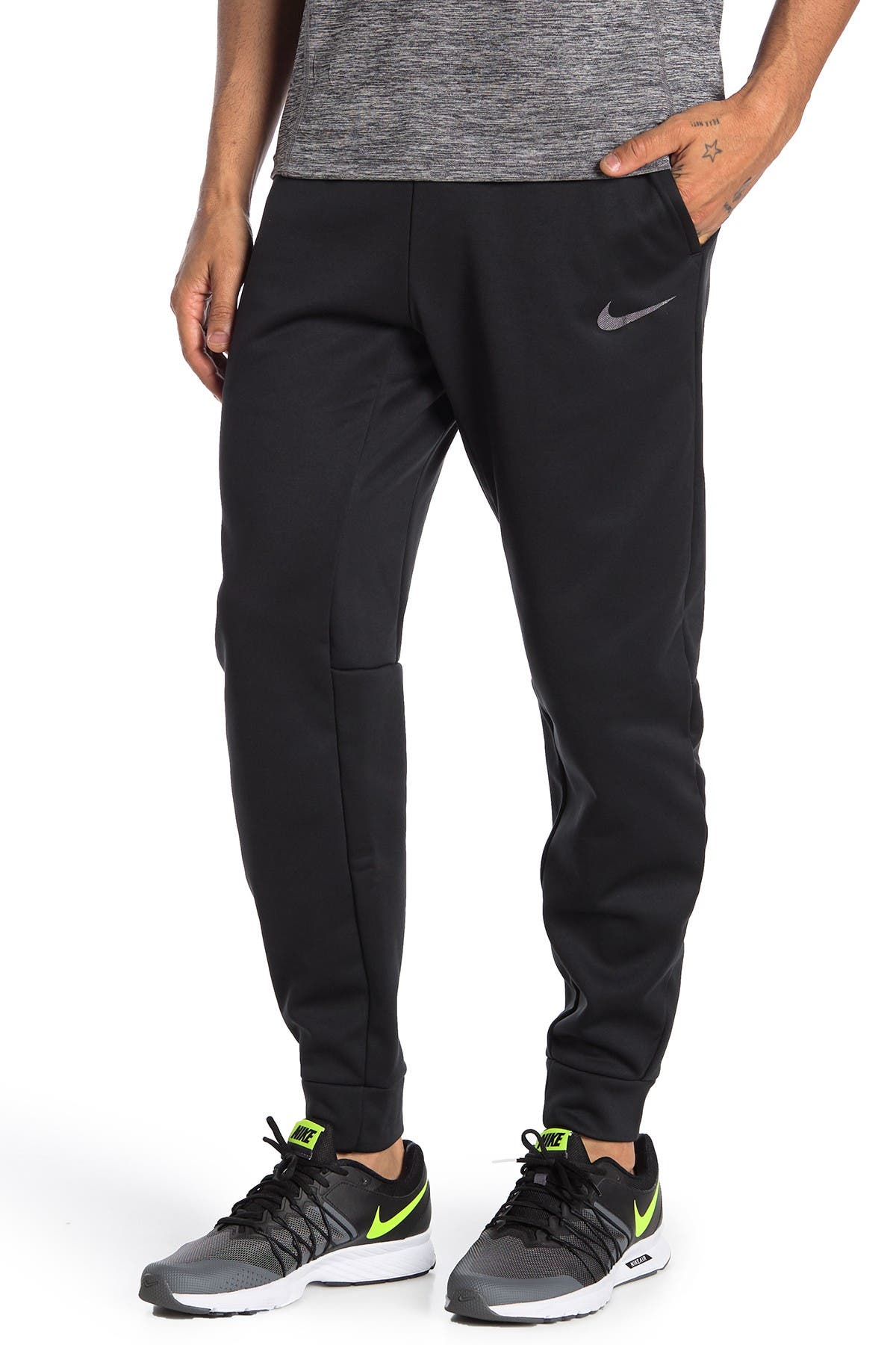 nike training therma tapered joggers in black