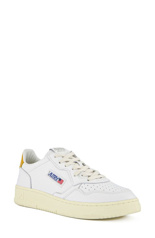Autry Sneakers In Leat/leat Wht/hny Ylw