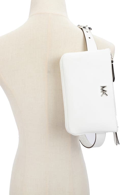 Shop Michael Michael Kors Reversible Leather Belt Bag In Optic White