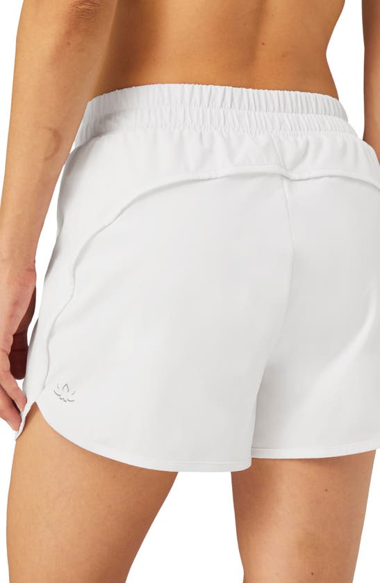Shop Beyond Yoga In Stride Lined Shorts In True White