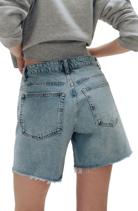 Shop Reformation Raye Relaxed Mid Thigh Denim Cutoff Shorts In Tenaya