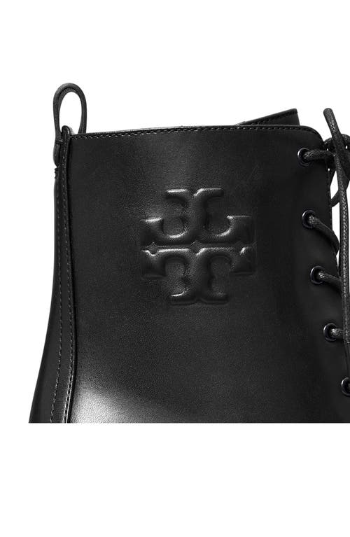 Shop Tory Burch Logo Embossed Lug Boot In Perfect Black/perfect Black