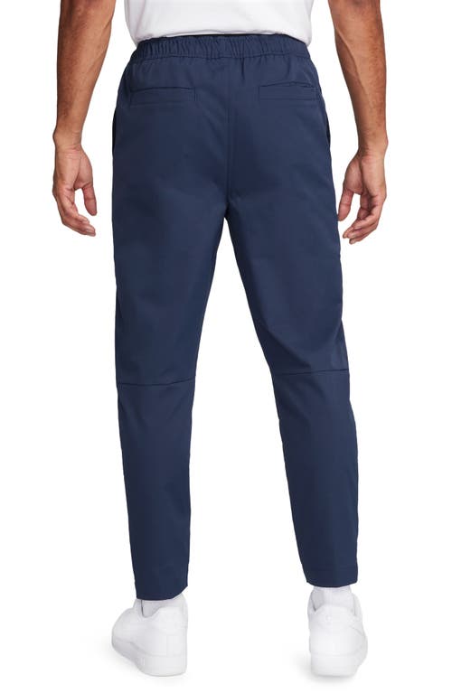 Shop Nike Woven Tapered Leg Pants In Midnight Navy/white