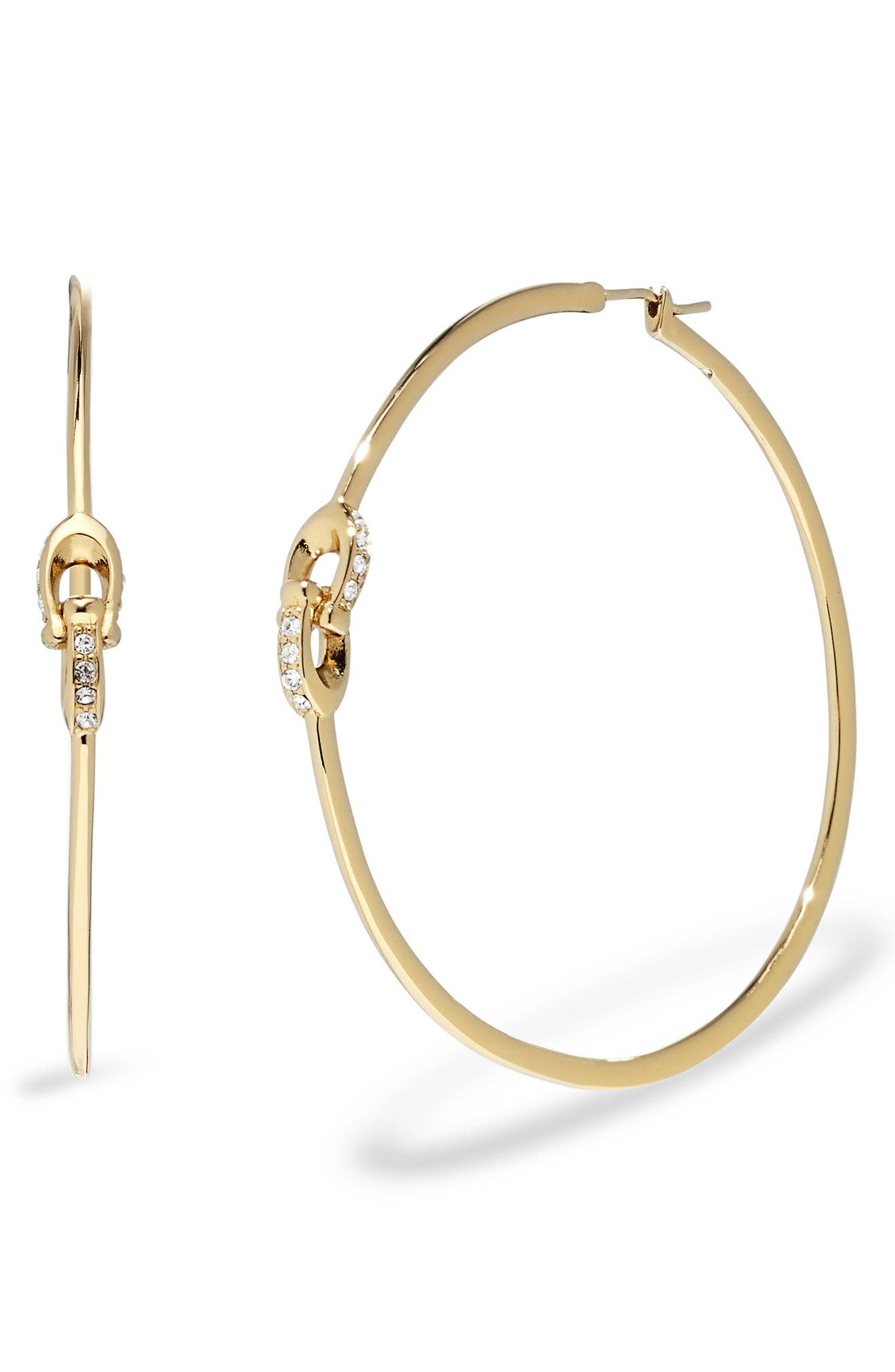 Elevate Your Style: The Allure of Coach Gold Hoop Earrings