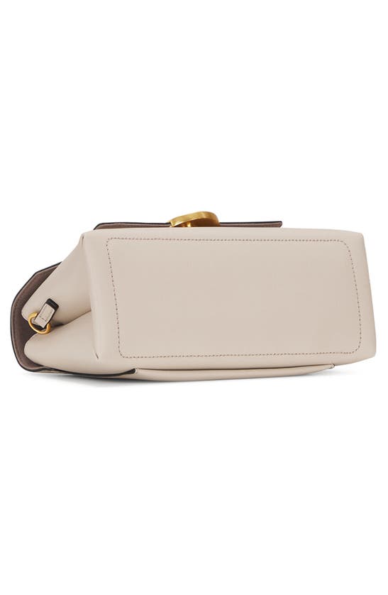 Shop Oryany Lottie Flap Crossbody Bag In Cream