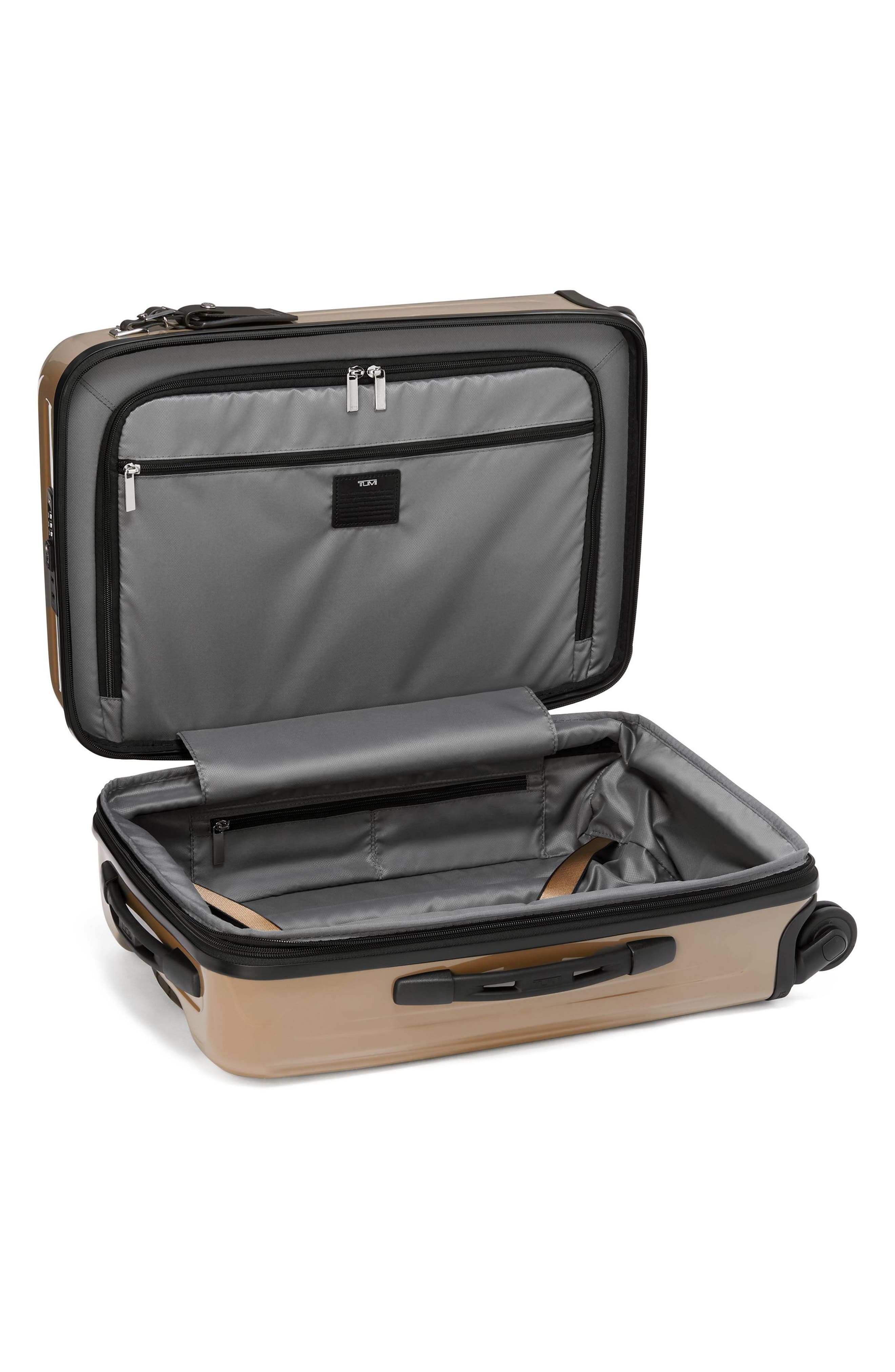 tumi spinner carry on