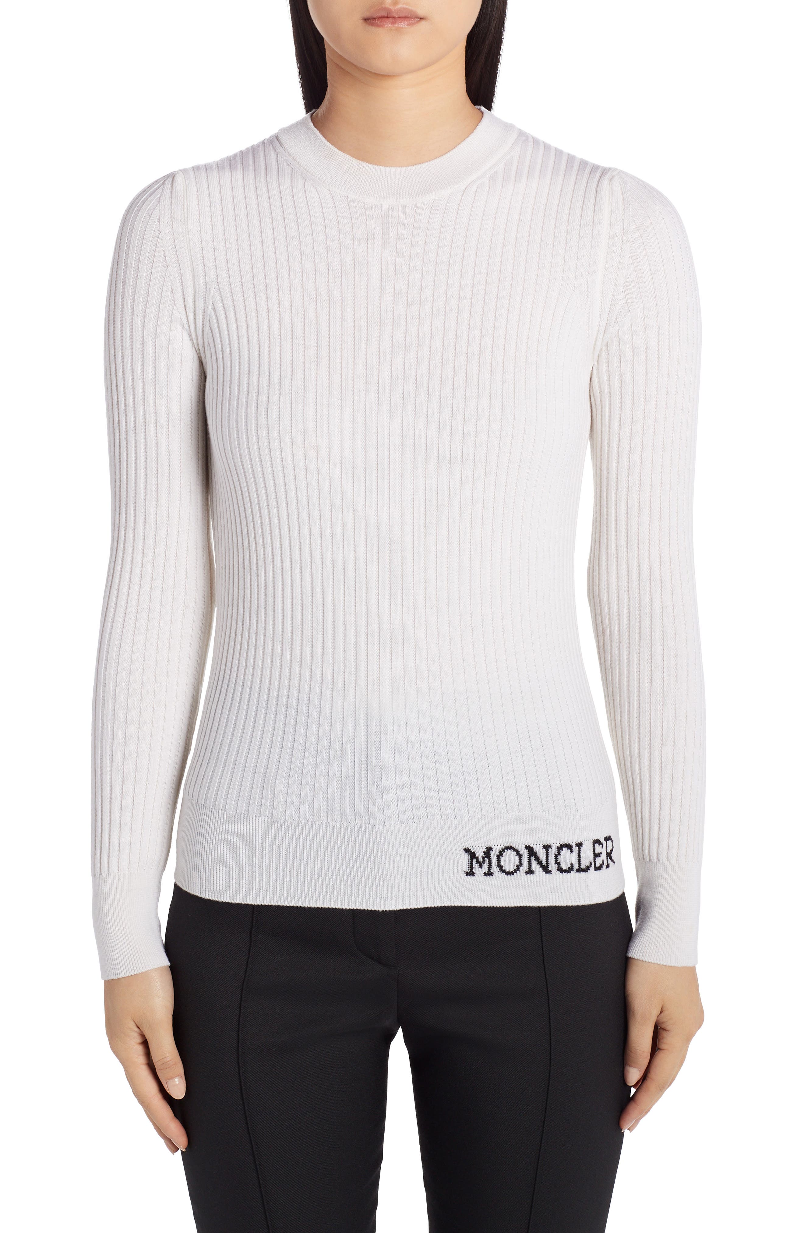 white designer sweater