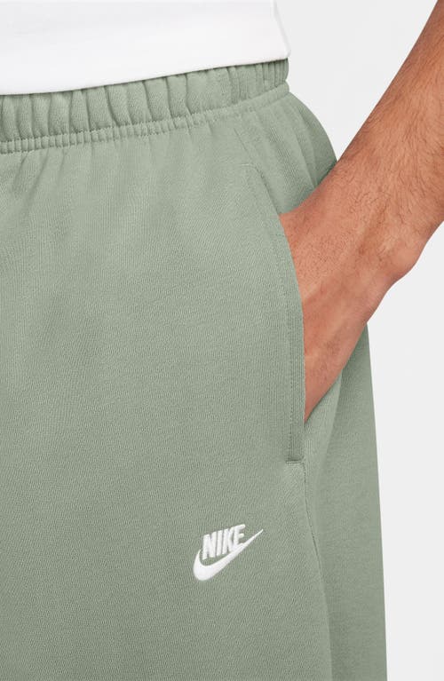 Shop Nike Club Fleece Oversize Pants In Jade Horizon/jade Horizon