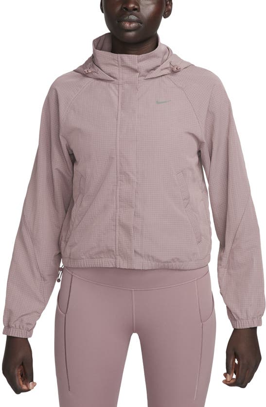 Nike Repel Water Repellent Hooded Jacket In Pink