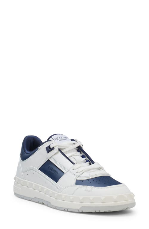 Shop Valentino Garavani Rockstud Low Top Sneaker In Fc6 - Bianco/worker