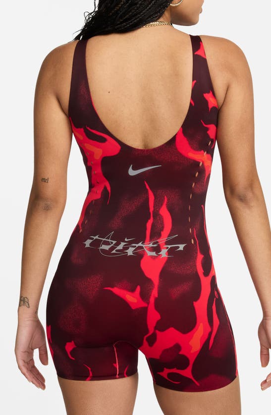 Shop Nike X Megan Thee Stallion Stretch Romper In Black/ Light Crimson
