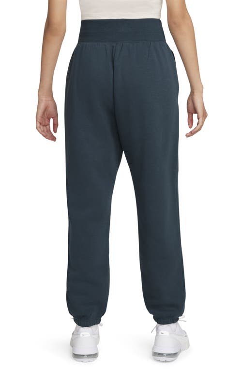 Shop Nike Sportswear Oversize Fleece Sweatpants In Deep Jungle/sail