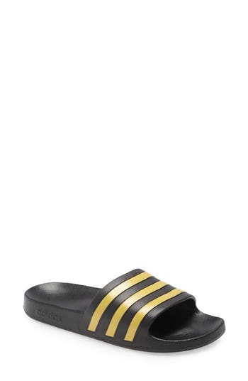 Shop Adidas Originals Adidas Adilette Aqua Slide Sandal In Core Black/gold/core Black