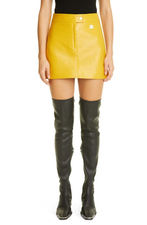 Courrèges Coated Stretch Cotton Miniskirt in Ochre