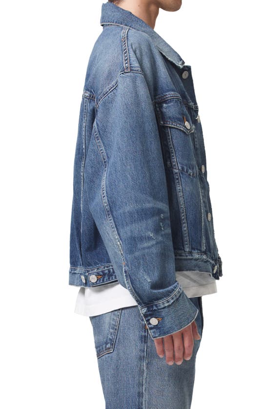 Shop Agolde Dorian Denim Trucker Jacket In Illuminate