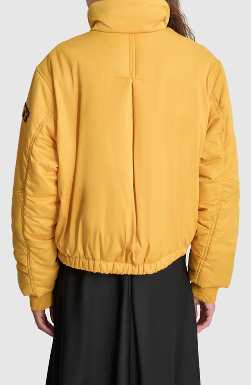 Shop Dkny Coated Satin Puffer Bomber Jacket In Goldenrod