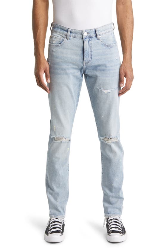 Dl1961 Theo Distressed Relaxed Tapered Jeans In Light Indigo Distressed