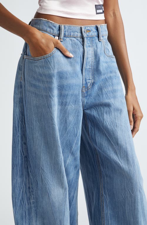 Shop Alexander Wang Low Rise Oversize Rounded Leg Jeans In Vintage Light Indigo