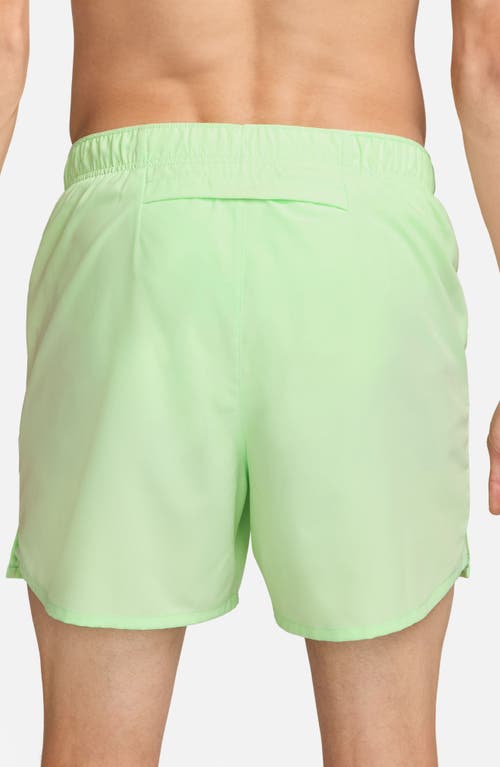 Shop Nike Dri-fit Challenger 5-inch Brief Lined Shorts In Vapor Green/vapor Green