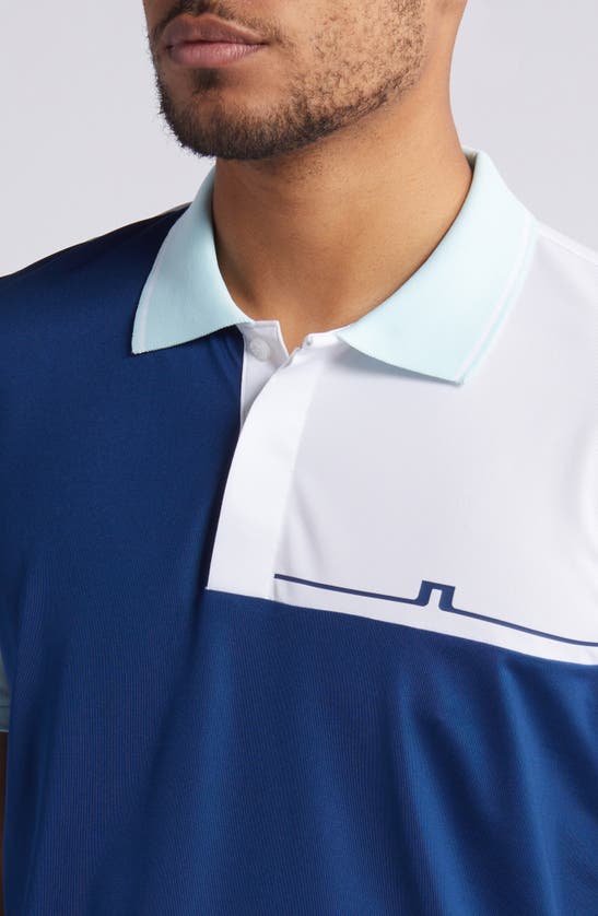 Shop J. Lindeberg Cliff Regular Fit Colorblock Performance Golf Polo In Estate Blue