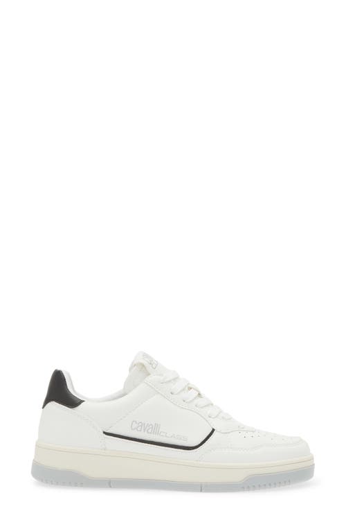 Shop Roberto Cavalli Low Top Perforated Sneaker In White/black