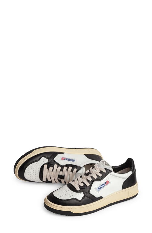 Shop Autry Medalist Low Sneaker In White/black