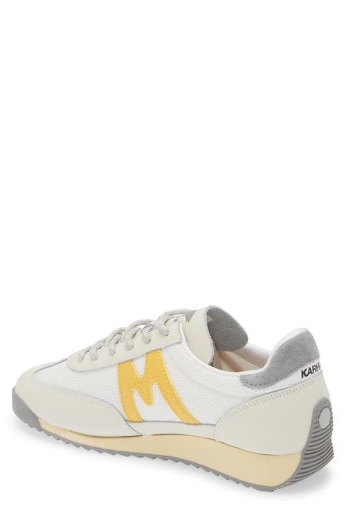 Shop Karhu Gender Inclusive Mestari Sneaker In Lily White/banana